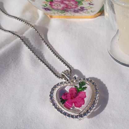 One of a Kind, Handmade Pendant using dried flowers under acrylic cabochon dome. This Pendant is two sided and is like two necklaces in one.