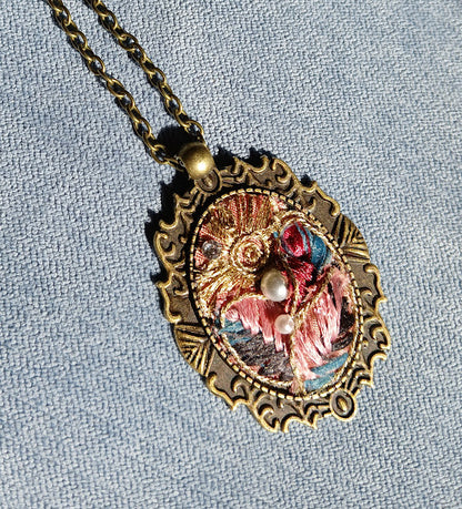 One of a kind, handmade Fabric Pendant. Elegant, brocade ribbon fabric. Arranged in an old fashion historical Cameo bezel. adjustable length